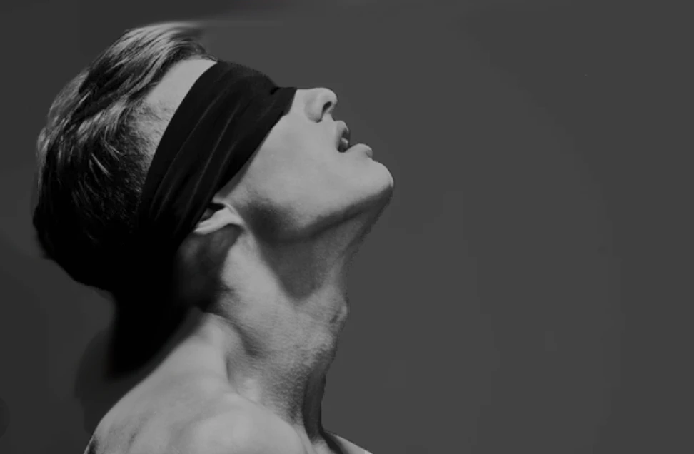 BDSM beginner trust with a blindfold